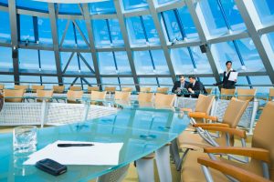 Customary conference room: glassy table, chair, large window